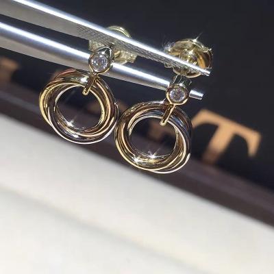 Chine Bijoux faits sur commande à extrémité élevé de boucles d'oreille de trinité avec trois bandes entrelacées à vendre