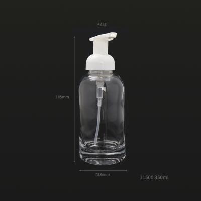 China Popular 250ml 500ml Amber Frosted Round Glass Hand Soap Bottle With Pump for sale