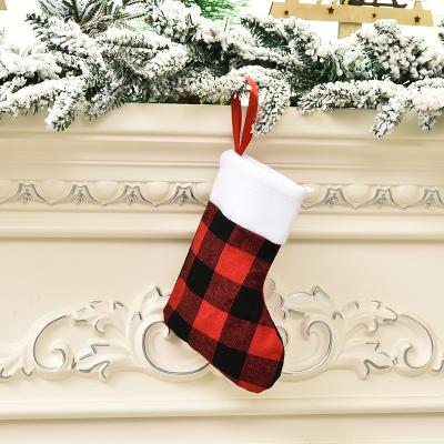 China Popular Christmas Jars 2021 Christmas Ornament Lattice Patterns Small Christmas Stocking Christmas Tree Ornaments Hanging Candy Bags for sale