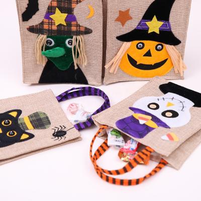 China Reusable Portable Nonwoven Themed Hallowmas Party Halloween Pumpkin Candy Tote Bag Halloween Party Gift Bag for sale