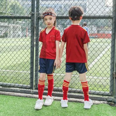 China Sets 2021 Hot Selling Drop Ship Kids Sports Kit 1 Kids Football Set Singlets With Shorts Football Kits for sale