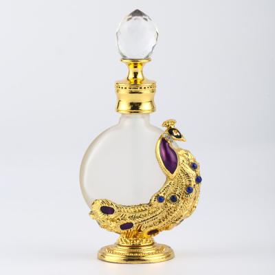 China Personality Dubai Classic Luxury Peacock Perfume Bottle Arabian Glass Perfume Oil Dropper Packing Bottle for sale