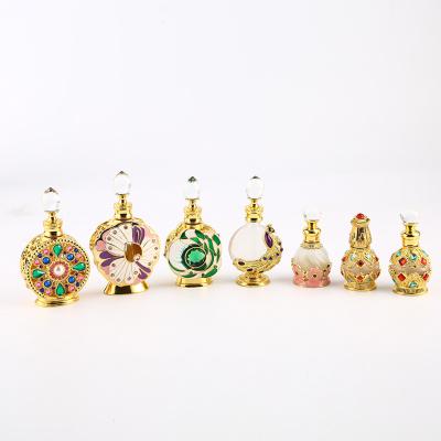 China Personality Vintage Metal Glass Perfume Bottle Arabic Style Essential Oils Stick Bottle Empty Perfume Bottle for sale