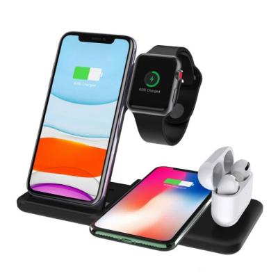 China Multi-Function Foldable 4 in 1 Magnetic Fast Wireless Charger Stand for Mobile Phone Watch 15w Wireless Charger for sale