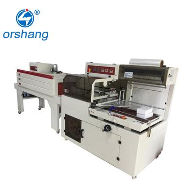 China Food Packing Machine For Bottles Heat Shrink Film Wrapping Machine 2021 New Design for sale