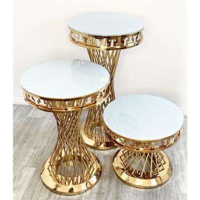 China Unique romantic round wedding decor stainless steel cocktail gold cake table dessert stands pedestal for sale