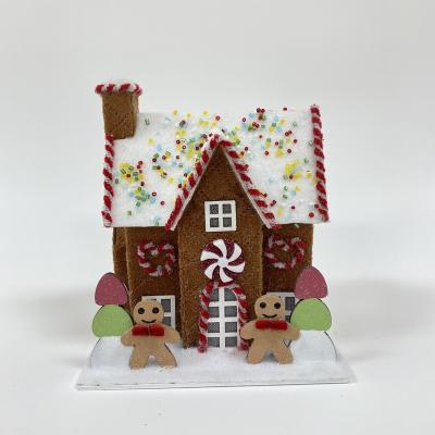 China Popular Christmas Gift Factory Direct Handcraft Exclusive Christmas Cardboard Paper House Brown Gingerbread Man Shape Villa Design Decoration for sale