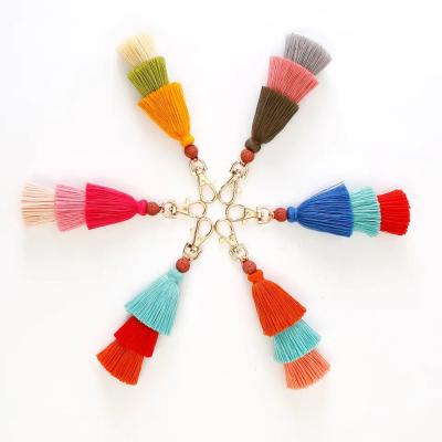 China Handwoven Cotton Fringe Bag Pendants European and American National Wind Retro Volcanic Stone Key Chain Pendants for sale