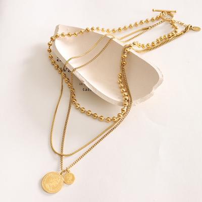 China TRENDY Greek Fashion Colorfast Round Label OT Buckle Three Layer Necklace for Women for sale