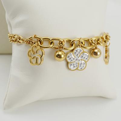 China TRENDY Wholesale Rose Bracelet Women European American 18K Gold Stainless Steel Diamond Bracelet Jewelry for sale