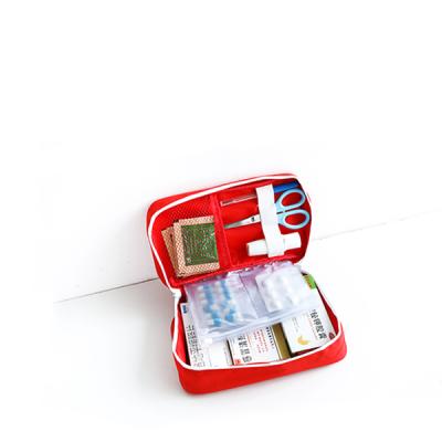 China Waterproof First Aid Kit Travel Emergency Handheld First Aid Bag for sale