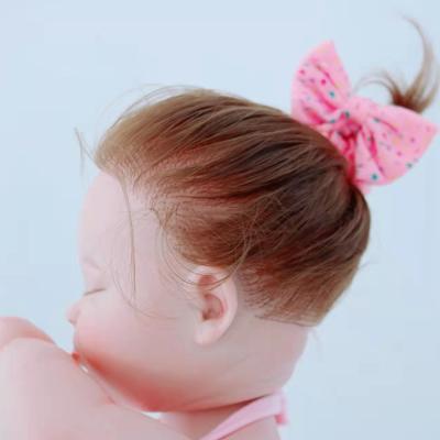 China Cute Soft Fashion Bebe Reborn Baby Dolls Reborn Silicone Limb Movement Sleeping Baby Dolls for sale