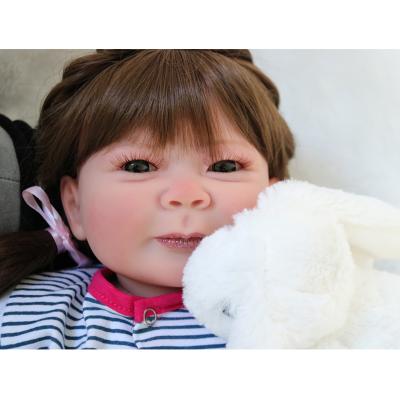 China Changeable Clothing 22 Inch Reborn Vivid Baby Doll Realistic Realistic Simulation Lovely Doll for sale