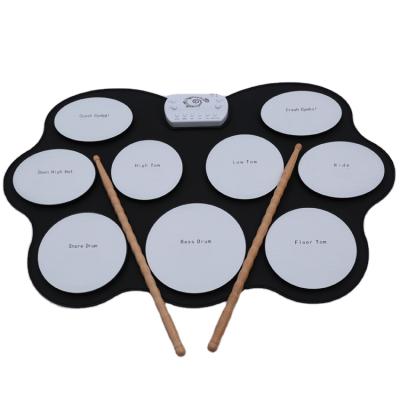 China Portable Mini Musical Instrument Drum Silicon Hand Roll Drum DTX Play Drum Set Pad Big Size for sale