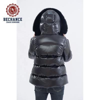 China Anti-Wrinkle Most Fashion And Warmest Shiny Black Nylon Fabric For Women Winter Down Jacket With Hoody for sale