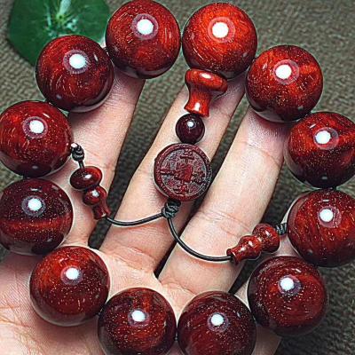 China Old Material Buddha Bracelet Red Sandalwood Beads Full Gold Cute Star Bracelet For Women for sale