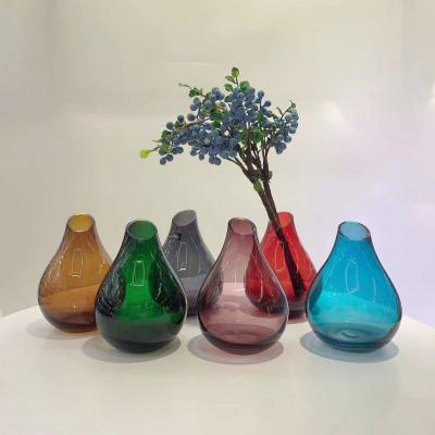 China Small mouth home flower bottle crafts to living room contemporary wholesale European creative glass dining table vase Statistical Institute for sale