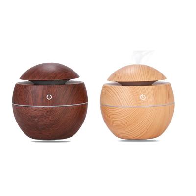 China Portable Ultrasonic Humidifier Mini Wood Grain Aroma Household Air Diffuser 130ml Mini Desk Air Humidifier Planter for sale