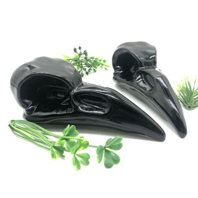 China China Wholesale Bulk Natural Spirit Healing Obsidian Raven Crystal Skulls For Halloween Gift for sale