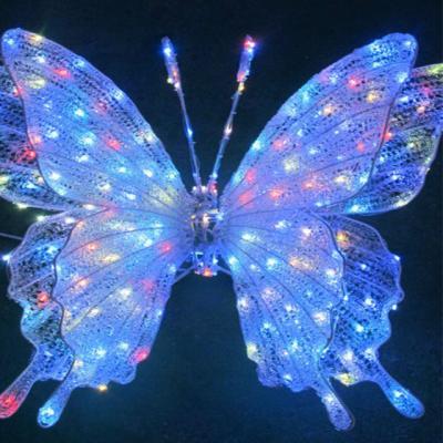 China 3D resistance wire frame pattern Christmas UV light coloful twinkle led PVC butterfly cover lights butterfly boho light long earrings for sale