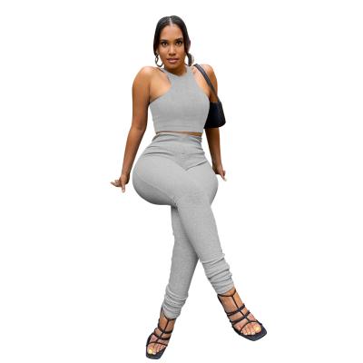 China 2021 Autumn Solid Color Breathable Wholesale Ladies Ribbed Sleeveless High Waist Stacking Two Piece Suit for sale