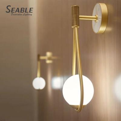 China Golden Contemporary Sound Gallery Corridor Wall Light Design Raindrop Shape Mounting Easy Mount for sale