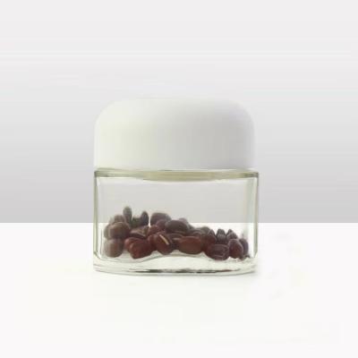 China Wholesale Food Use Creative Clear Round Glass Tea Canister 3oz Glass Jar With Lid for sale