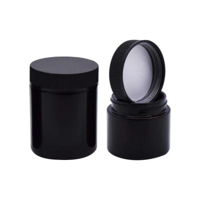 China Airtight Household Products Container Glass Shaped Glass Jars 2oz Black Round Glass for sale