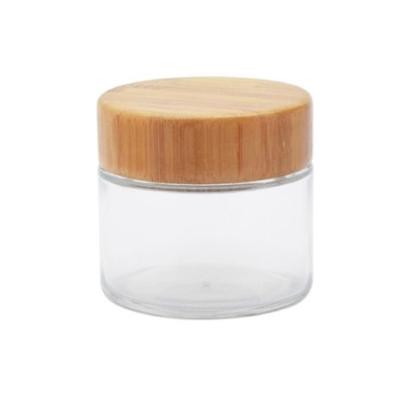 China 2oz Frost Clear Glass Cosmetic Jars Skin Care Cream Jar Cosmetic Jars With Bamboo Lid for sale