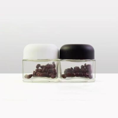 China Wholesale Creative Glass Food Jars With Lid Smell Proof Jar Storage Glass Bottles for sale