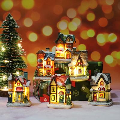 China PVC New Product Christmas Decorations Resin Small House Decoration Christmas Gift Small Lighthouse for sale