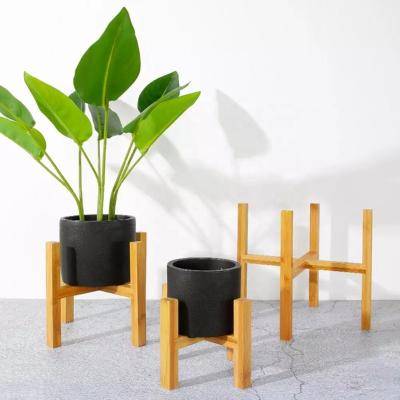 China Indoor&Outdoor Modern Bamboo Plant Stand Row Rack Potted Multi Planter Rack Shelf Rack Planter Display For Patio Garden for sale