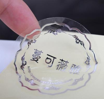 China Self Adhesive Costomized Printing Clear Round Label Gold Foil Seal Logo Sticker Waterproof for sale