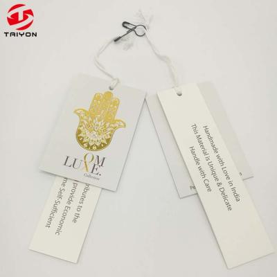 China Sustainable Super Thick Luxury Gold Foil Logo Paper Hang Tag For Clothing for sale