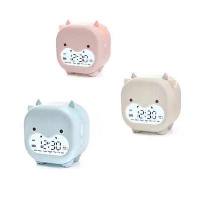 China Calendars Children Synchronize Sleep Forming Cute Calf To Wake Up Clock Silicone Lead For Baby Clock for sale