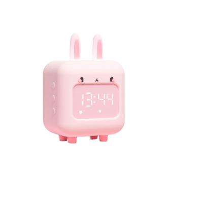 China Classes Rabbit Cute Rabbit Children's Bedroom Rabbit Light LED Music Wake Up Sunrise Silicone Digital Clock for sale