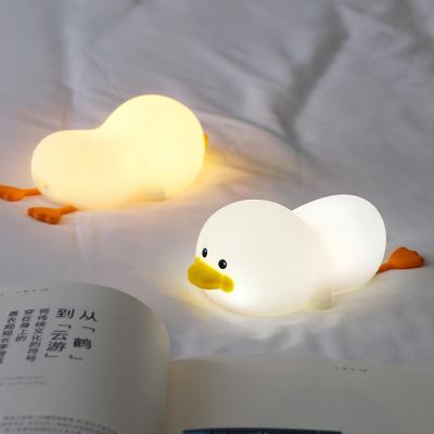 China Cartoon Modern Creative Children's Bedroom Bedside Lamp USB Silicone Duck Night Fill Tapping Lamp for sale