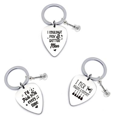 China Hot Selling Romantic Personalized Lettering BEST LOVE Guitar Picks Couples Titanium Steel Gift Metal Key Chains Custom Sample for sale