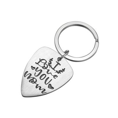 China FASHIONABLE Hot Sale Mother's Day Lettering MOM Creative Guitar Picks Custom Titanium Steel Metal Key Chains Keychains for sale