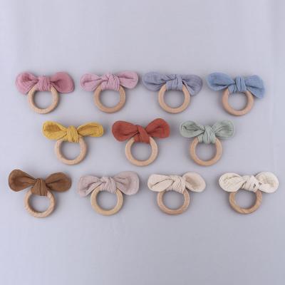 China Toy Material Safety Baby Wooden Teether Butterfly Shape Soft Baby Molar Toys Can Add Logo Baby Beech Teether for sale