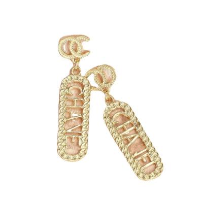 China New high quality long letter fashion luxurious temperament personality soft women's earrings for sale