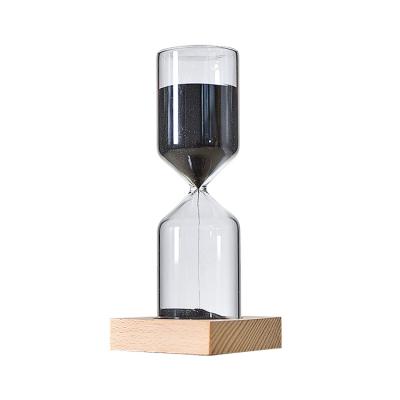 China Custom Logo Printed Minimalist Sand Timer Cylindrical Hourglass with Wooden Base for sale