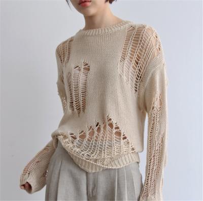 China Anti-wrinkle 2022 Spring Women Hollow Out Knitted Pullover Top Fashion Loose Casual Streetwear Female Tops Hole Chic See Through Sweater for sale