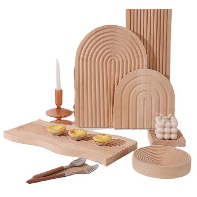 China New Oval Diamond Water Ripple Eco-Friendly Drag Tray Solid Wood Corrugated Bread Cutting Board for sale