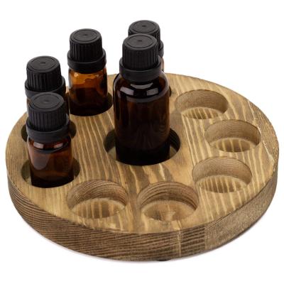 China Living storage wholesale customization essential oil rack young small round wooden shape essential oil rack for sale