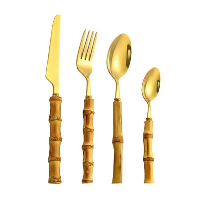 China Sustainable Eco-friendly 304 Stainless Steel Bamboo Handle Cutlery Set 4 Piece Flatware Sets for sale