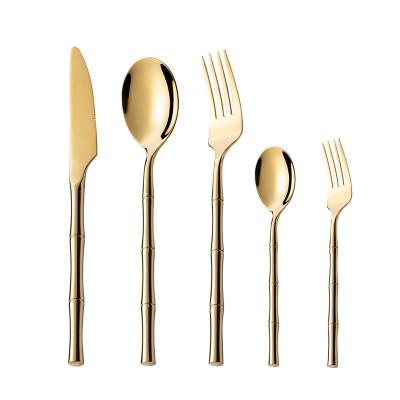 China New Design Stocked Shape Handle Bamboo Flatware Sets Mirror Polished Stainless Steel Cutlery Sets For Wedding for sale