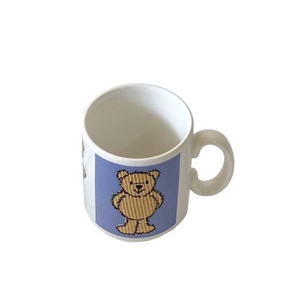 China Custom Design Viable Drawing Porcelain Water Tea Cup Cartoon Coffee Mug Bear Ceramic Serving Mugs for sale