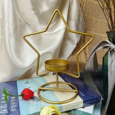 China Morden Metal Pentagonal Shape Luxury Unique Golden Candlestick Holders Handcraft Home Candlestick For Table for sale