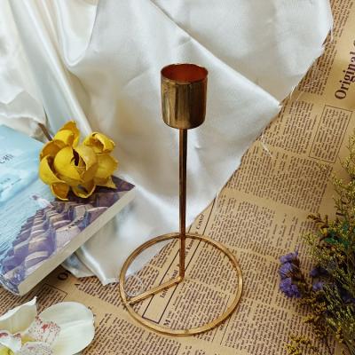 China Vintage Luxury Gold Living Room Candlestick Holder Morden Metal Home Decor Candlestick for sale